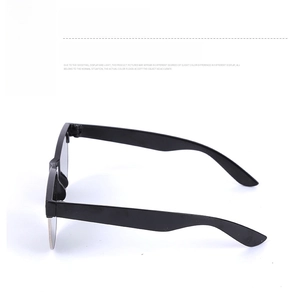 Detail view of the sleek curved temples on these matte black outdoor sunglasses