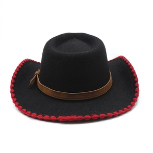Detail of red stitching on black western felt cowboy hat with brown suede band