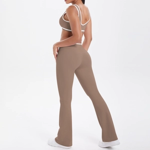 Mocha brown yoga set detail showing white contrast trim and crossover waist design