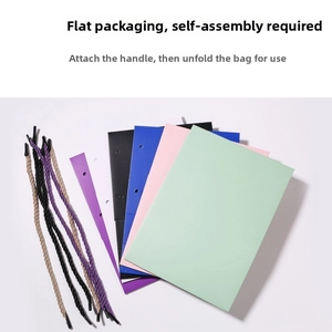 DIY colorful paper gift bags shown flat with matching ropes for manual assembly