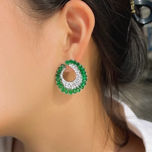 Elegant S925 silver C-shaped earrings with green oval gemstones and micro-pave zircons