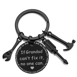 Detail view of black stainless steel tool charms and engraved plaque for grandad keychain