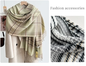 Detail of houndstooth scarf with fringe, showing weaving texture and gold thread accents