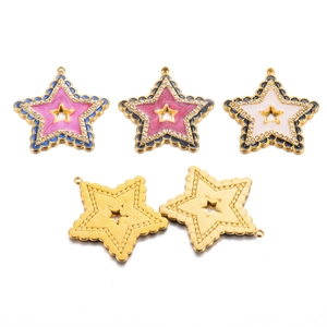 Macro detail of star-shaped pendants with colorful enamel, zircon inlay, and gold finish