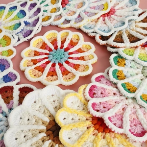 Handmade gradient crochet flower coaster in soft colorful yarn for table decoration