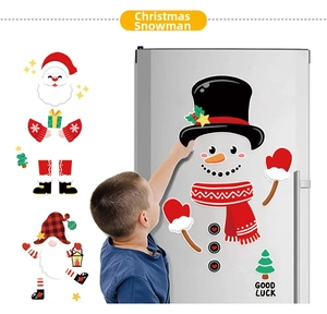 DIY Christmas fridge magnets set featuring Santa, snowman, and tree on metal fridge