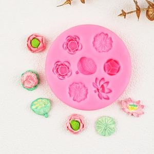 Pink silicone mold featuring 3D lotus and leaf designs for fondant and chocolate crafts