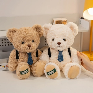 Cute teddy bear plush dolls with backpacks and ties in brown and cream white colors