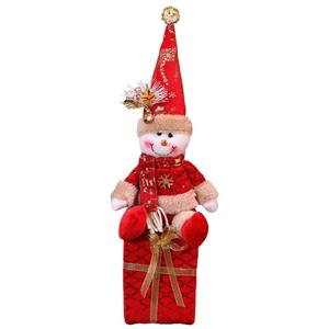 Christmas snowman plush decoration with red gift box base and sequined pointed hat