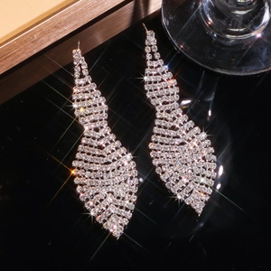 Elegant silver tassel earrings with geometric rhinestones for luxury party wear