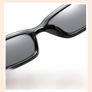 Details der Vintage-Kinder-Sonnenbrille mit bequemen integrierten Nasenpads in Schwarz