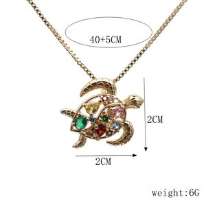 Detailed view of turtle pendant size 2x2cm with colorful stones and 40+5cm chain
