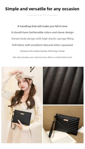 Detail of black quilted handbag featuring V-shaped stitching and gold metal bar accents