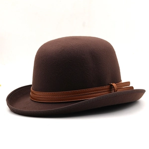 Detailed view of dark brown wool bowler hat featuring a stitched leather band decoration