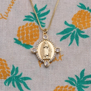 Golden copper necklace with Virgin Mary pendant and clear cubic zirconia stones
