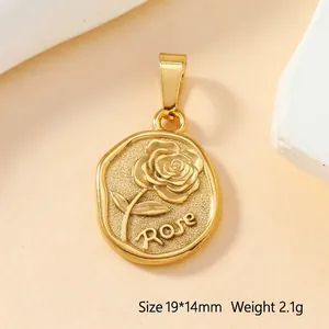 Detailed macro view of 19x14mm gold stainless steel rose oval charm with engraving
