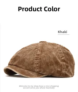 Detail of khaki corduroy fabric texture on a vintage newsboy cap with stitched panels