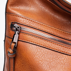 Brown leather tote bag with lychee texture and high-quality dark metal zipper hardware
