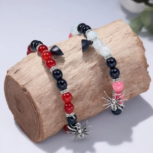 Halloween spider heart magnetic bracelets with colorful agate beads on wood stand