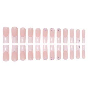 French tip press-on nails set with subtle pink base and sparkling rhinestones