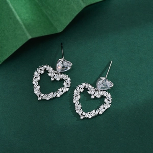 Elegant silver heart stud earrings with cubic zirconia stones in a double-heart design