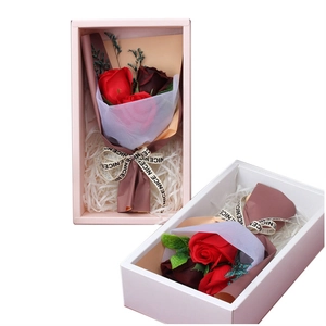 Artisanal soap flower gift boxes with artificial roses in pink and white packaging