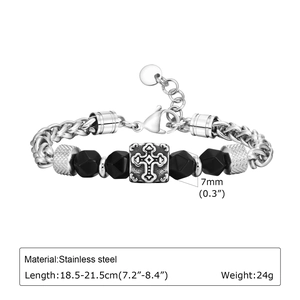 Close-up of vintage stainless steel cross bracelet with 7mm faceted black beads and size info