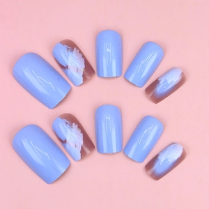 Blue graffiti and gold foil marble press-on nails set with 10 pieces on pink background