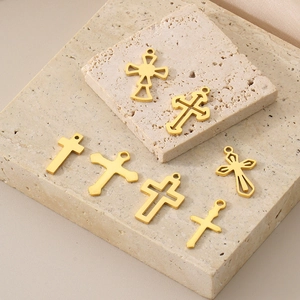 Detailed set of seven 18K gold-plated stainless steel hollow cross pendants for DIY jewelry