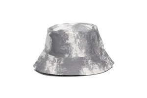 Close-up of gray tie-dye bucket hat showing cotton twill fabric and six-panel stitching