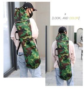 Detail of waterproof camo outdoor bag with side zipper pockets and drawstring closure