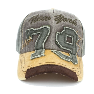 Detail of vintage denim baseball cap showing distressed 79 patch and New York embroidery