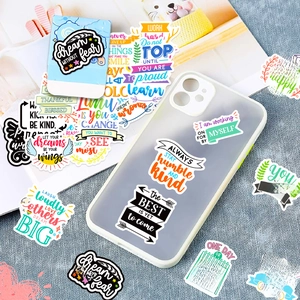 Detail showing motivational quote stickers applied to a clear phone case for decoration