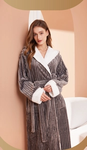 Detail of grey striped oversized hooded bathrobe with warm white fleece lining and belt