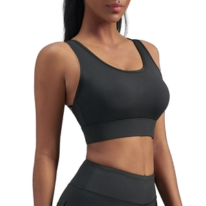 Brassière de sport noire extensible avec larges bretelles pour le yoga et le fitness