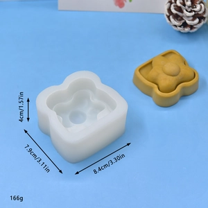 Thick flower shaped silicone mold with yellow floral resin craft and size measurements