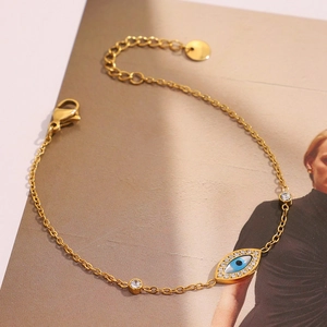 18K gold plated stainless steel evil eye bracelet with white rhinestones and enamel detail