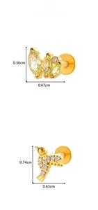 Detail view of G23 titanium labret studs with marquise zircon leaves and hummingbird designs