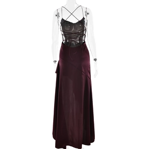 Detail of the cross-back lace-up design on a deep red satin evening gown dress
