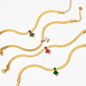 Golden snake chain necklace set with square zircon pendants in black white red and green