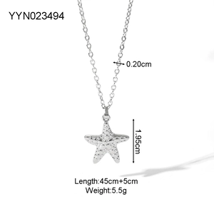 Macro view of starfish pendant showing 1.95cm height and 0.20cm chain width dimensions
