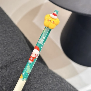 Detail of Christmas gel pen with 3D star ornament and Merry Christmas lettering