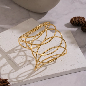 Exaggerated oval line intertwined open bangle in 18K gold plated stainless steel