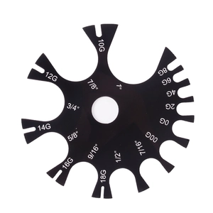 Black acrylic gauge wheel tool for measuring body piercing jewelry sizes and dimensions