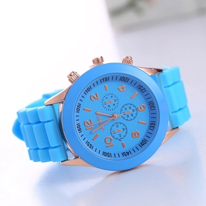 Detailed macro view of Geneva light blue silicone strap and rose gold watch case