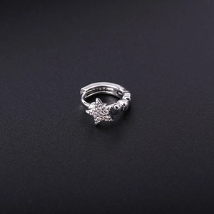 Detailed close-up of silver star hoop earring with sparkling micro-pave zircon stones