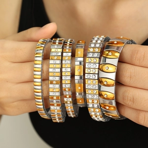 Gold and silver stainless steel stretch bracelets with sparkling rhinestones for women