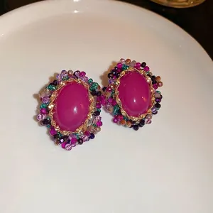 Vintage oval earrings with pink crystal and multi-color beaded gold-tone frames