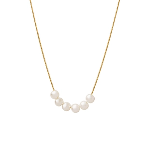 Elegant gold necklace featuring six round white pearls on a minimalist fine chain