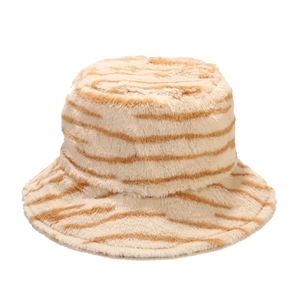 Fuzzy faux fur bucket hat with brown tiger stripes on cream background for winter